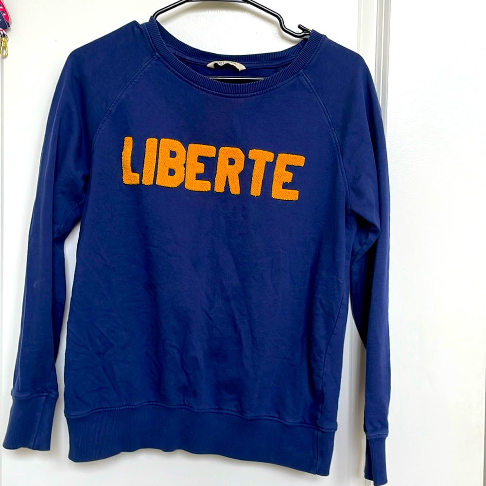 Blue sweat shirt